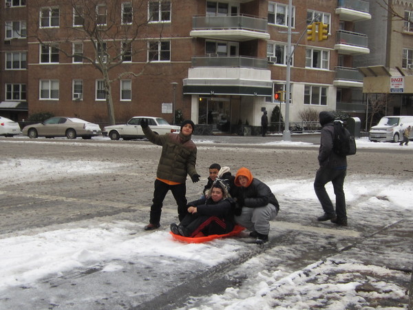 Sledding in Grand Army Plaza - Prospect Heights